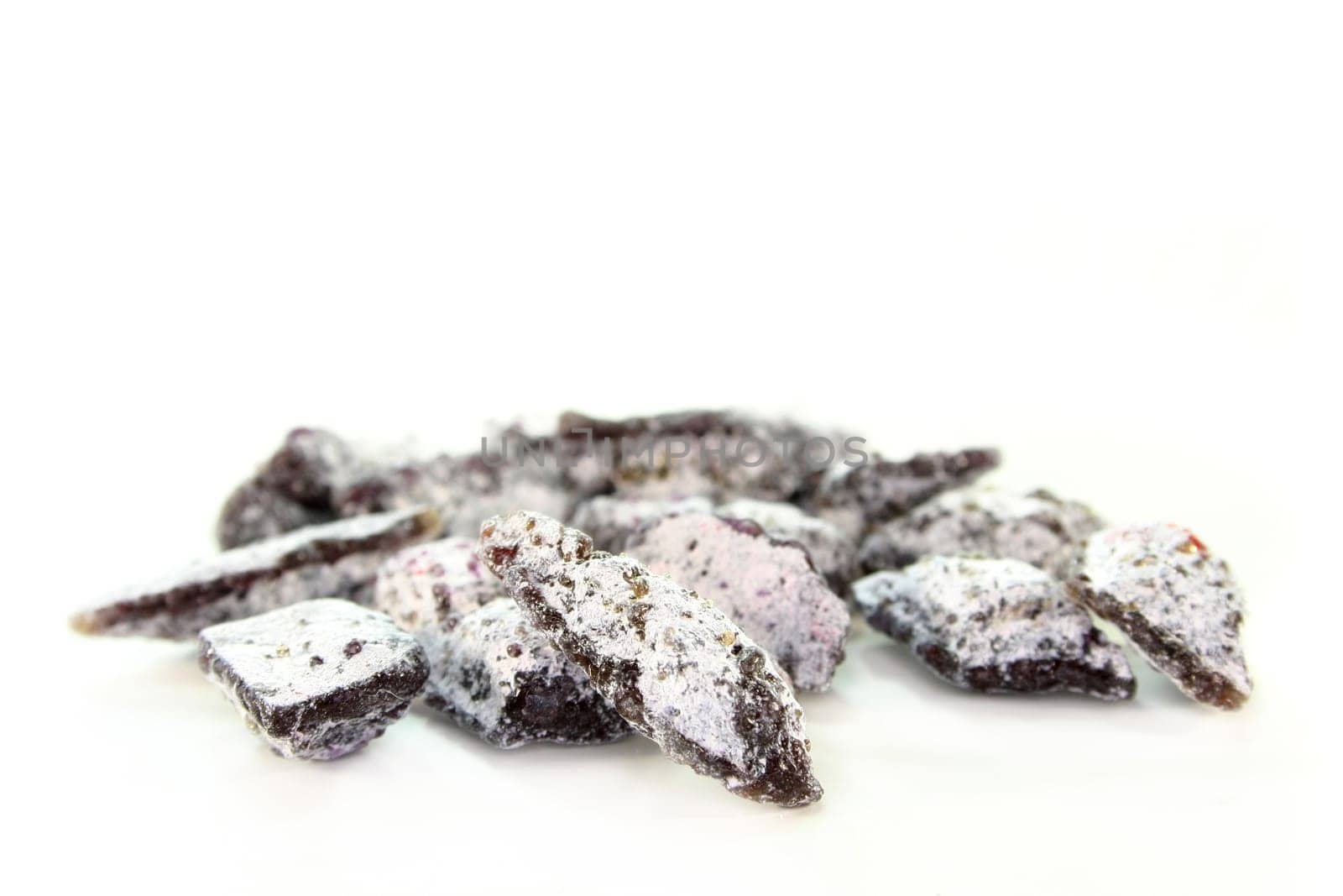 a handful of incense against a white background