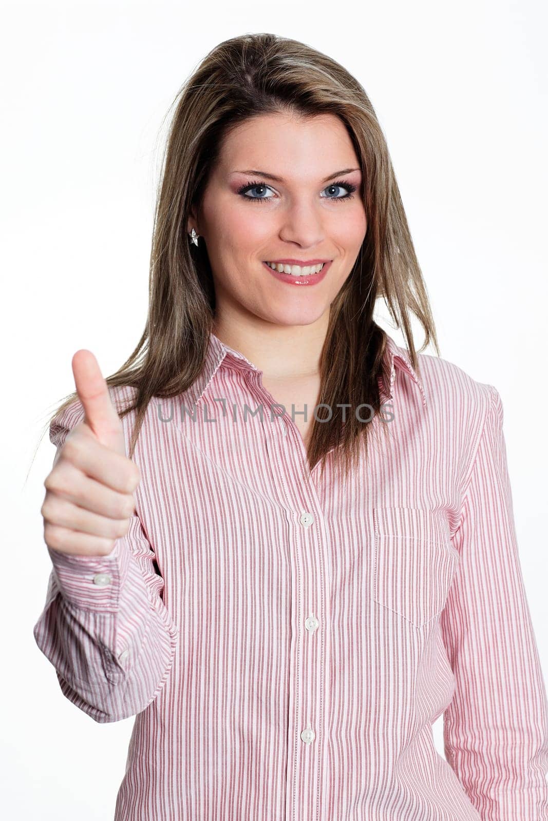 young beautiful woman in studio expressing success