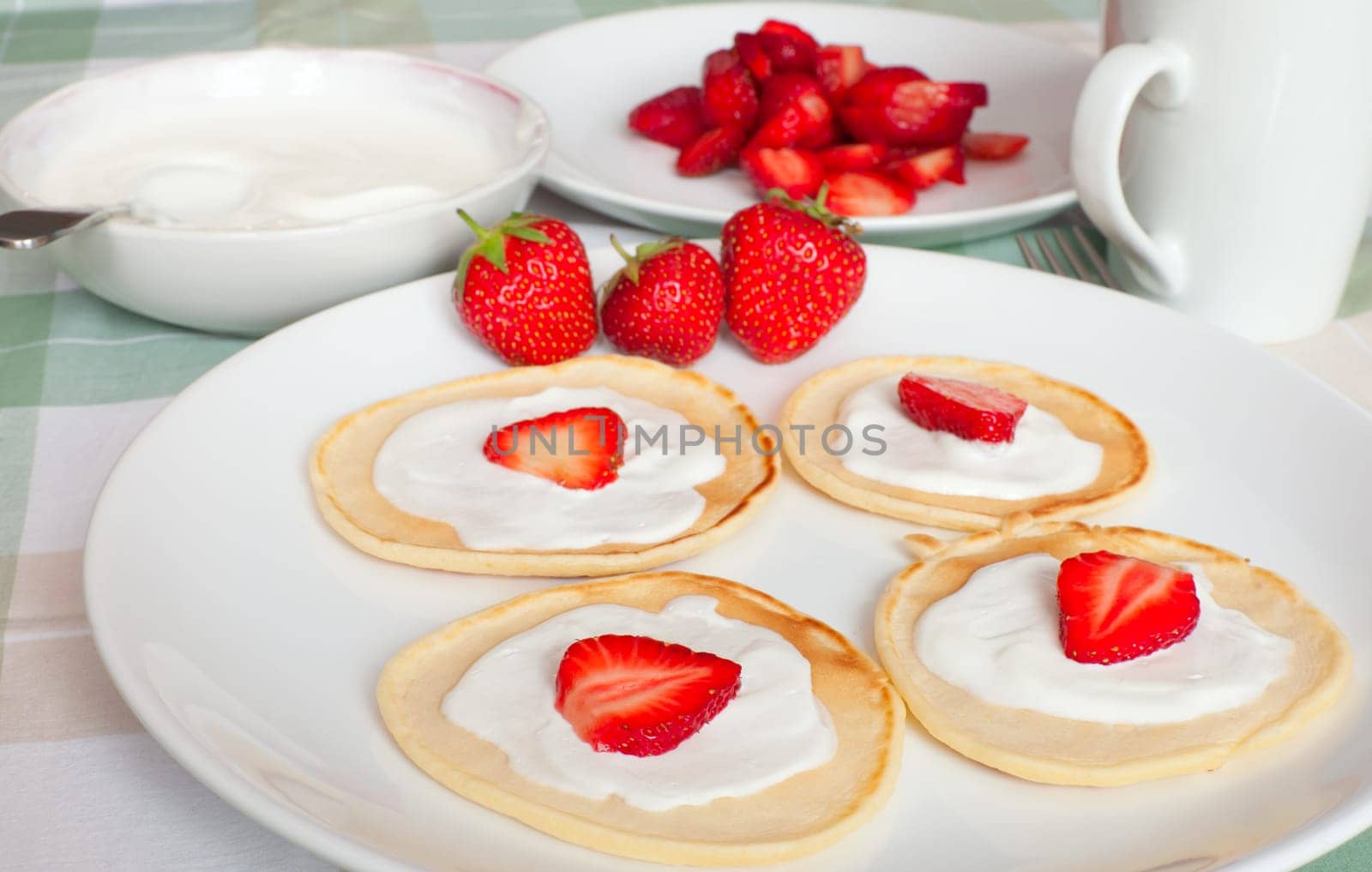 Homemade Flapjacks / Pancakes With Strawberries and Sweet Cream