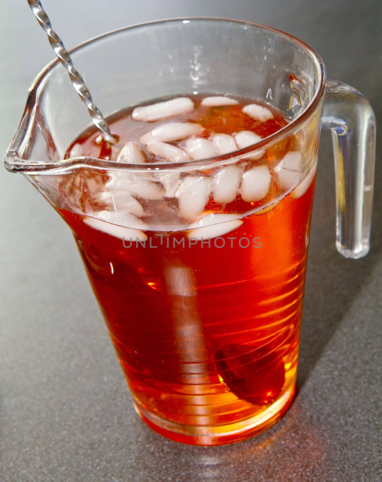 Red cocktail on a glass