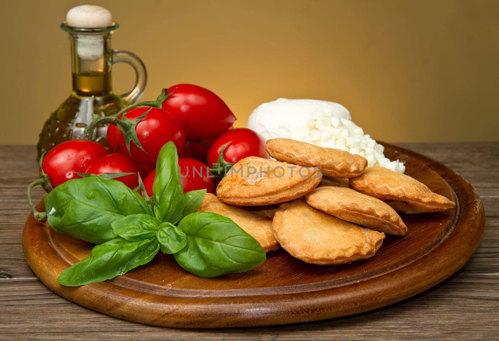 classic italian panzerotti with tomatoes and mozzarella