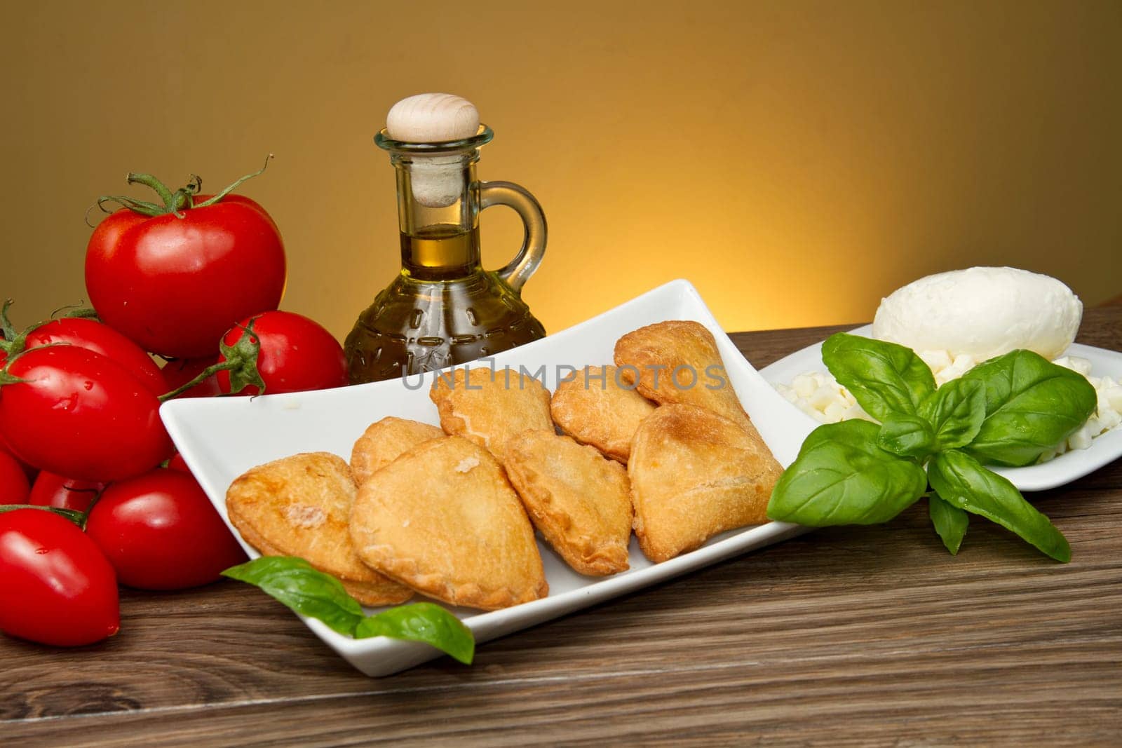 classic italian panzerotti with tomatoes and mozzarella