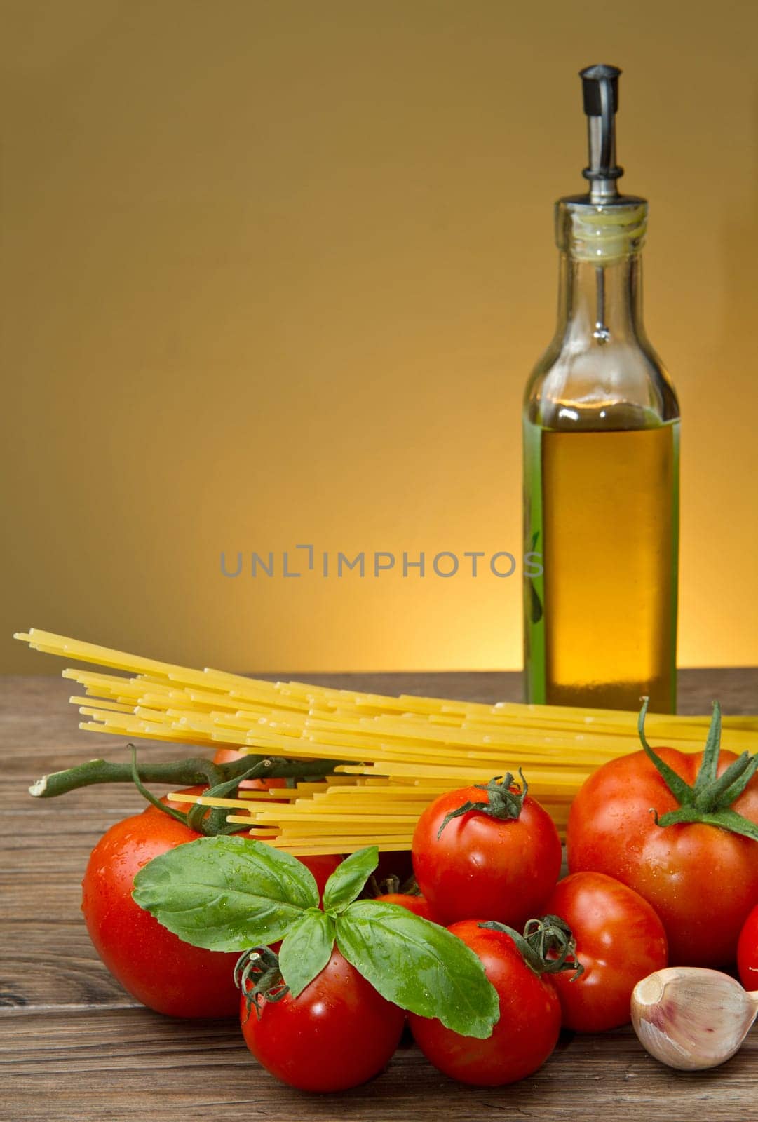 spaghetti ingredients on wood table
