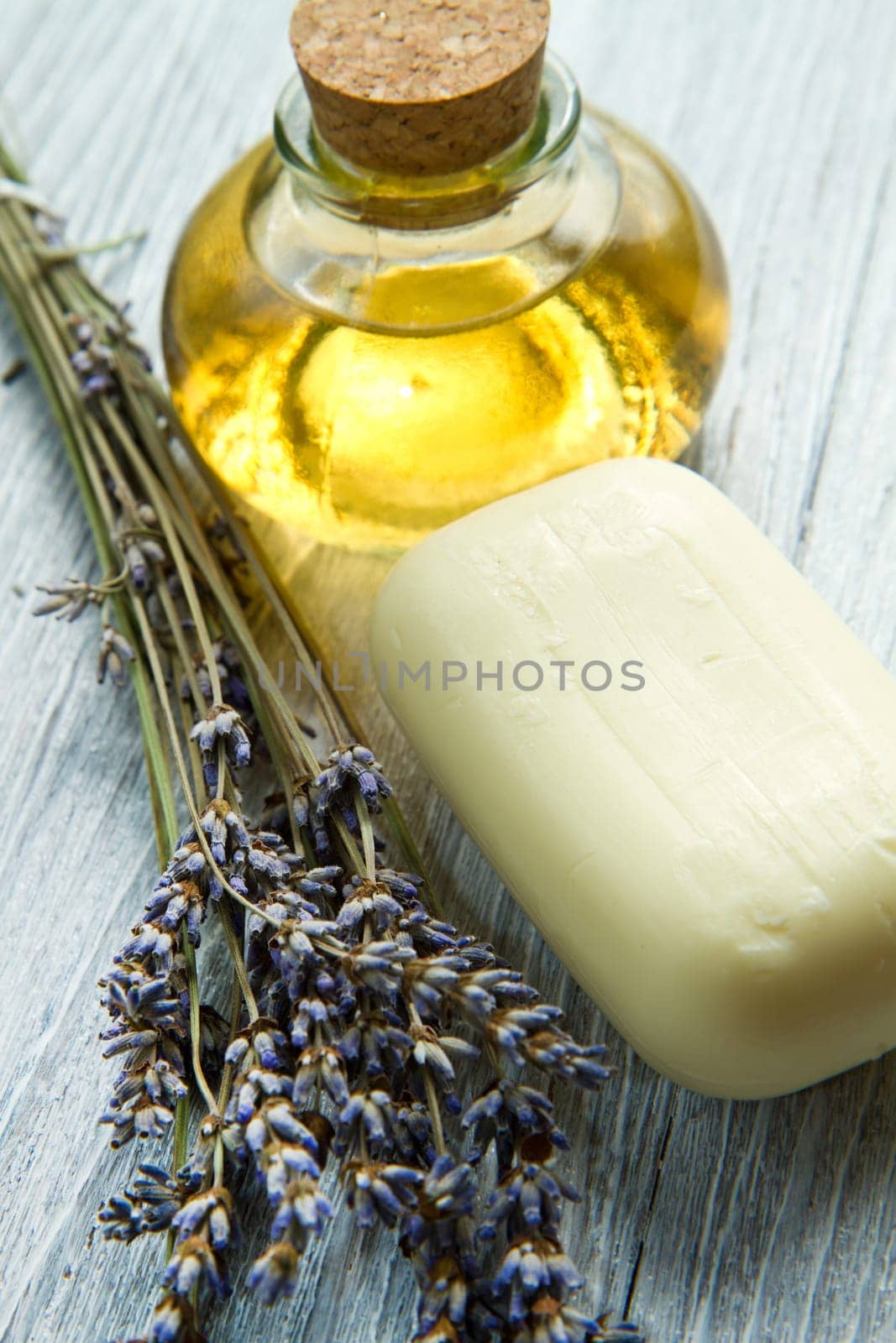 lanvander soap with flower on wooden background