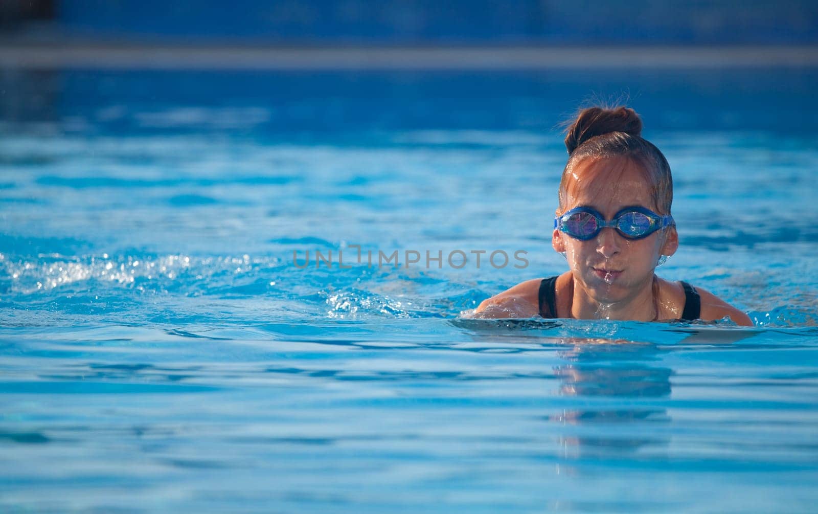 fitness woman swimming in pool