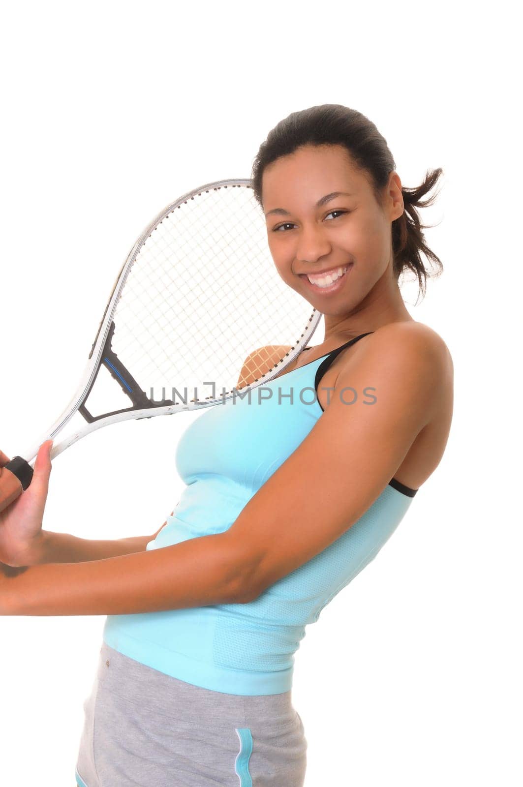 Lovely african american girl with tennis racket