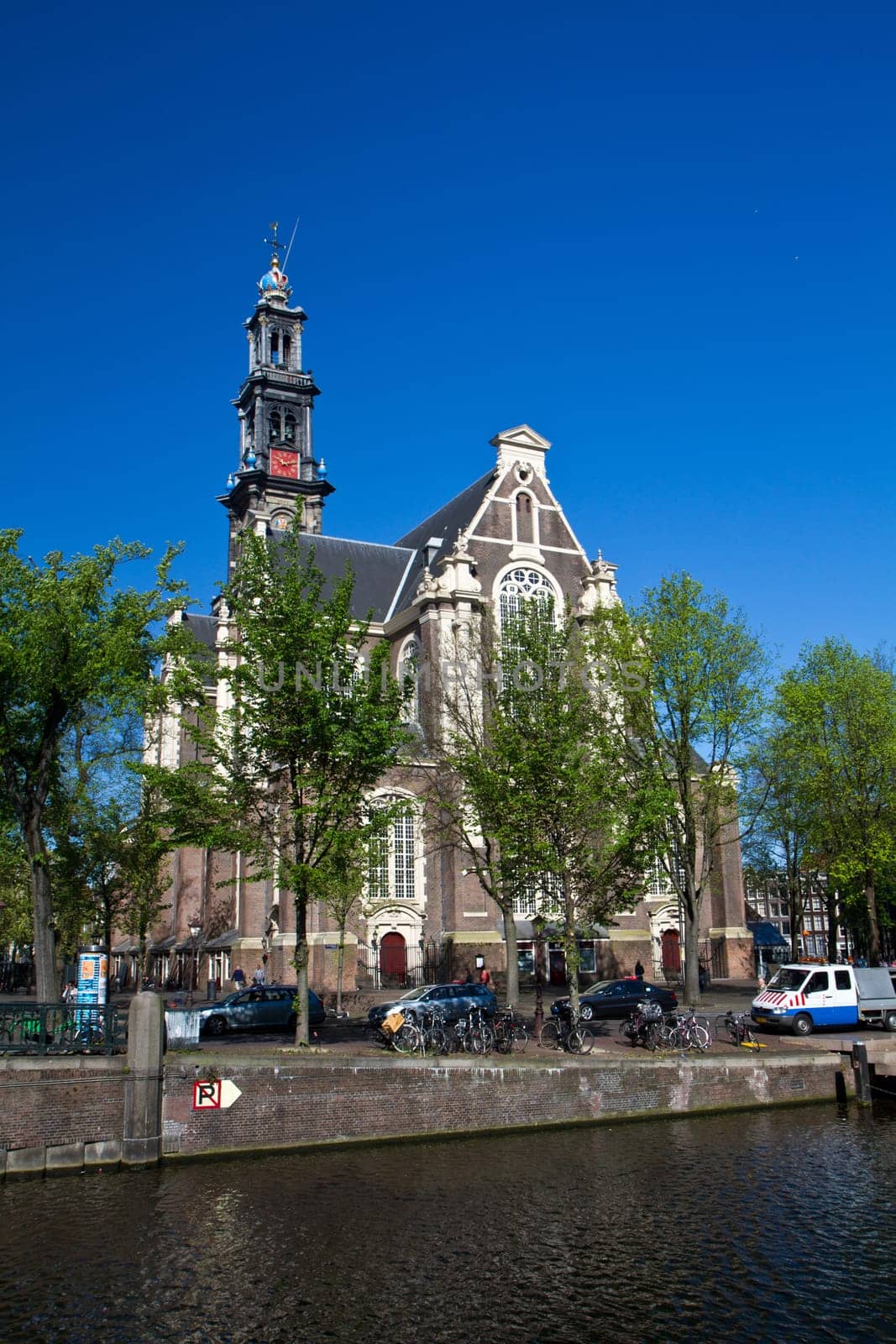 a photo of famous westerkerk in amsterdam