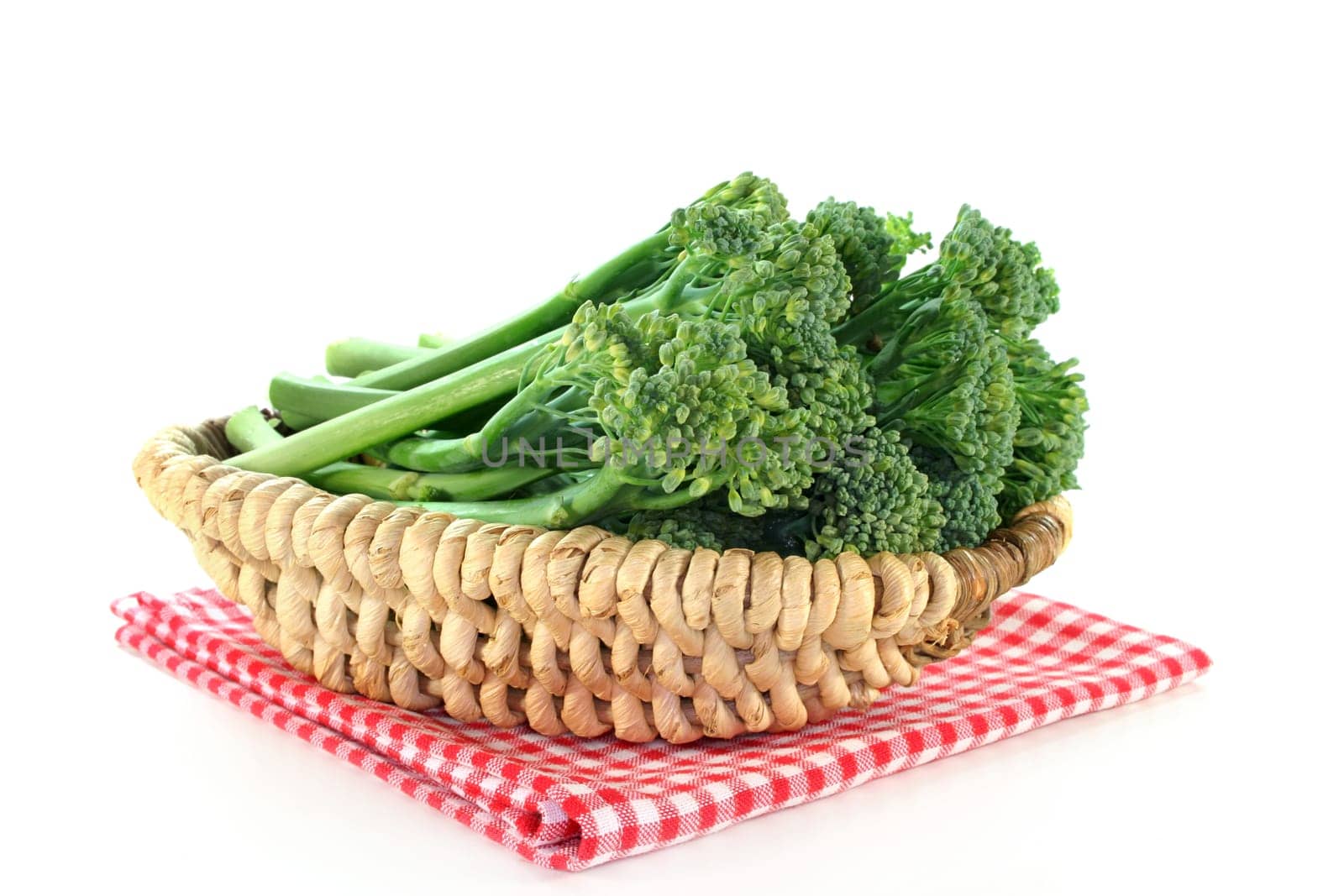 a few spears of spargoli in a basket