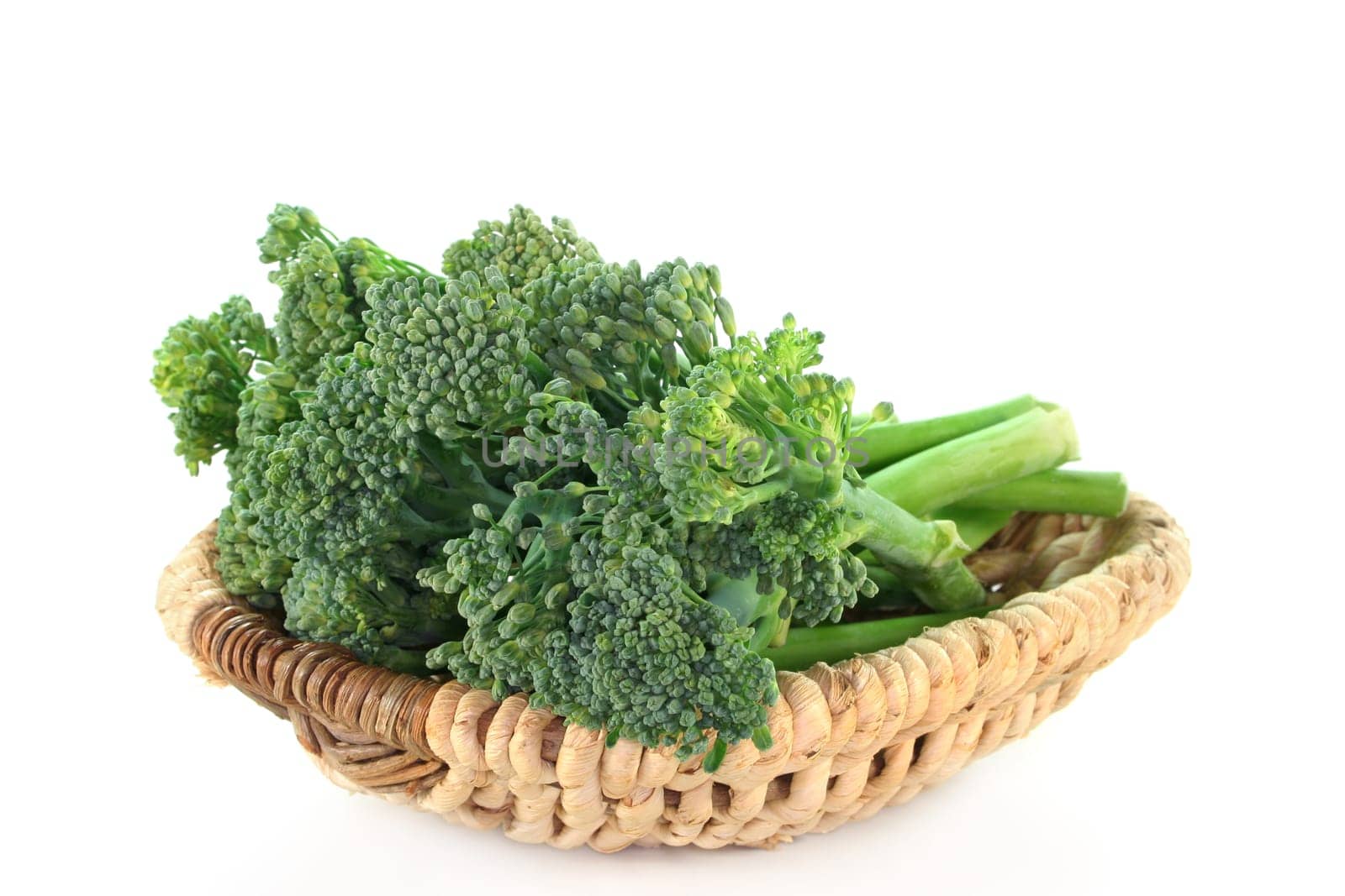 a few spears of spargoli in a basket