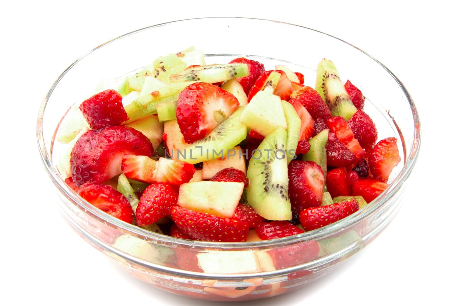 Fresh fruits salad on white background