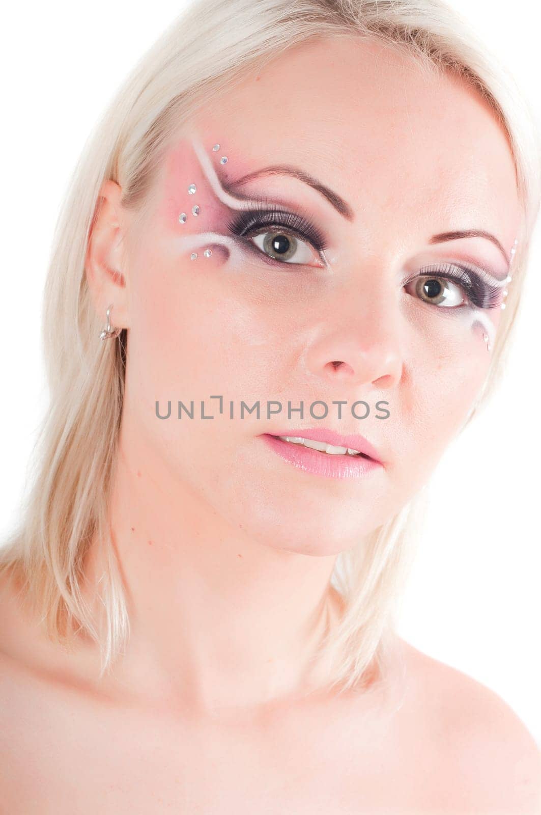 Studio shot of woman with face art isolated on white