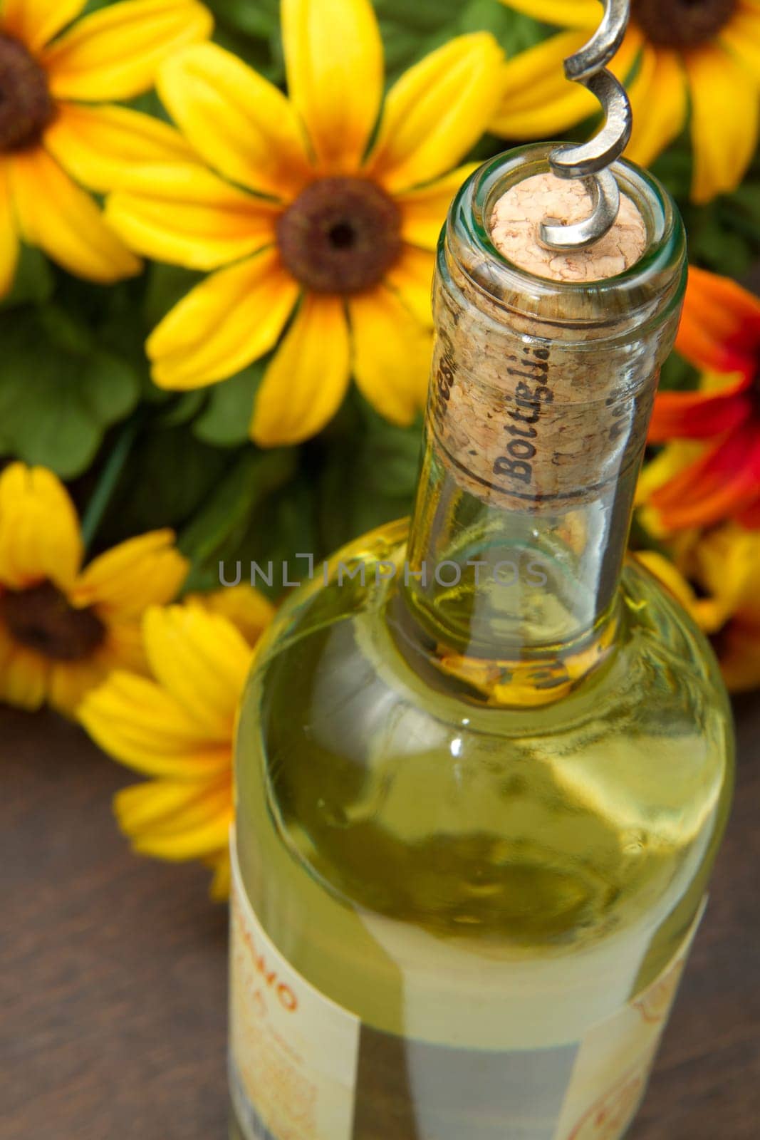 Opening a bottle of white  wine