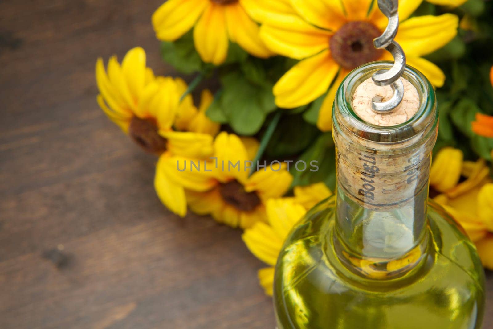 Opening a bottle of white  wine