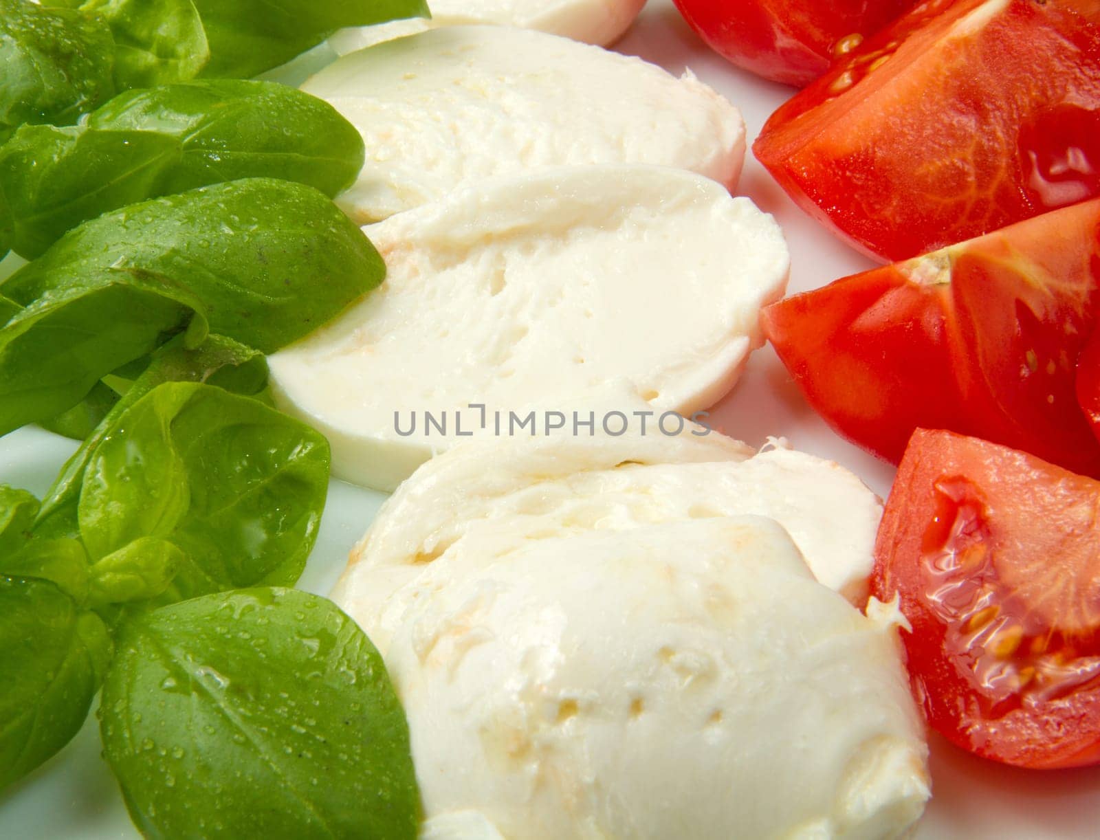 Italian flag made wit Tomato Mozzarella and Basil