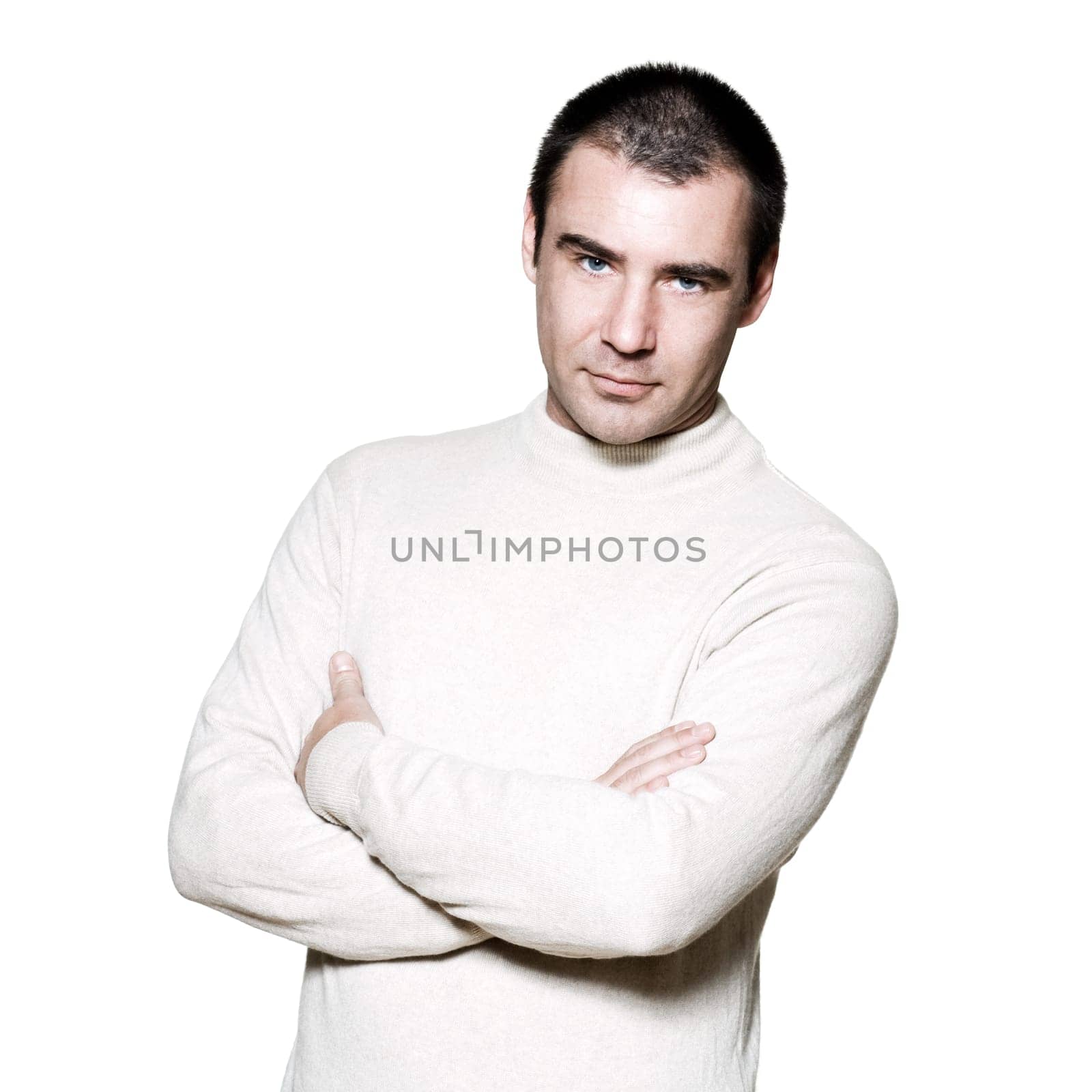 Portrait of a smart confident man with hands folded in studio on white isolated background