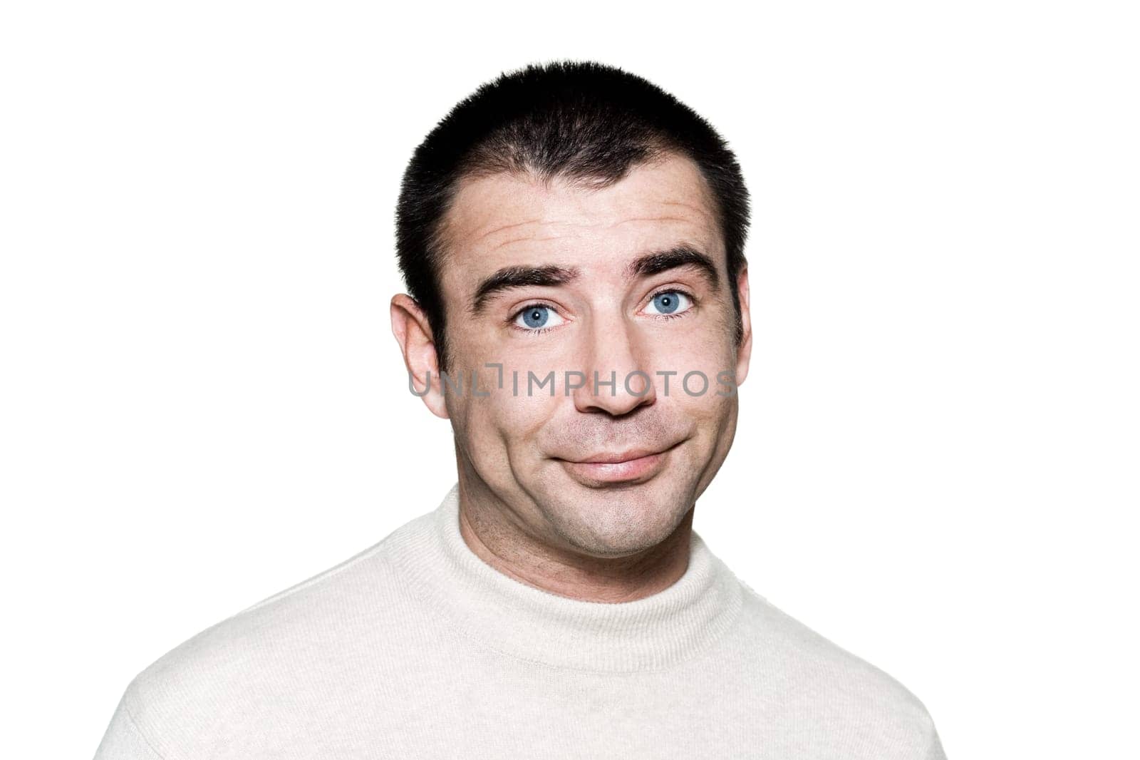 Portrait of a handsome expressive bored man in studio on white isolated background