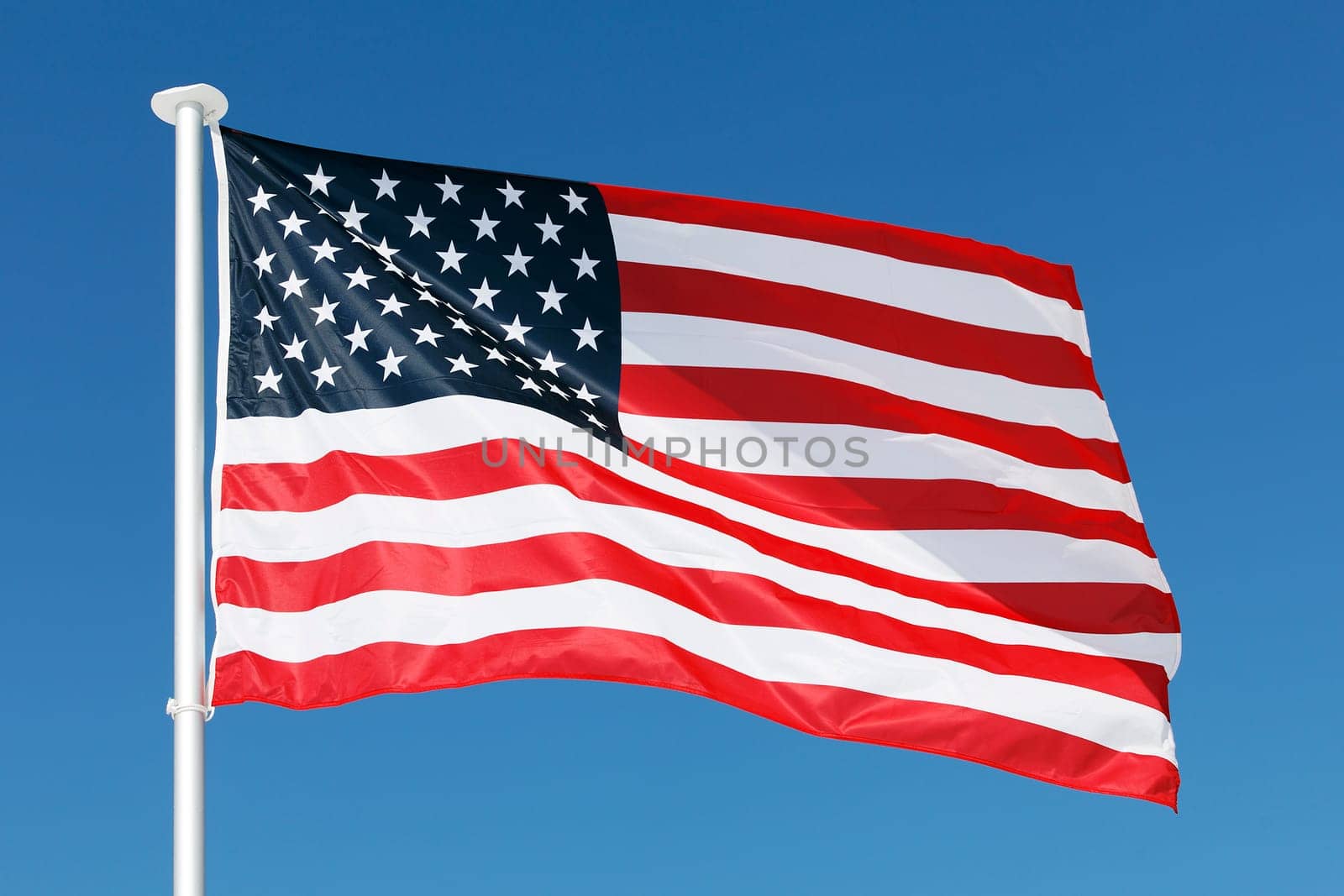 USA banner in blue sky in summer