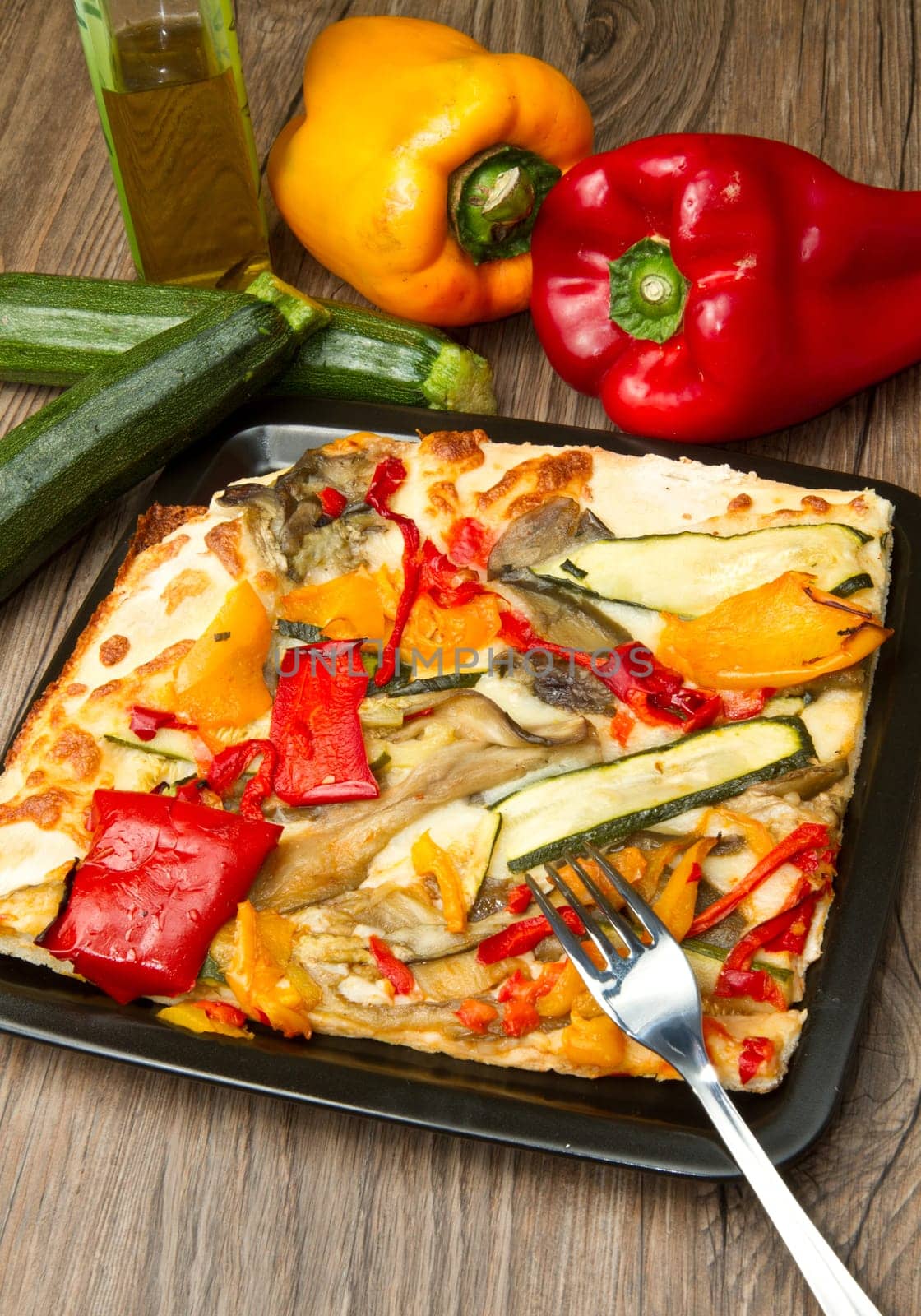 slice of pizza with fresh vegetables