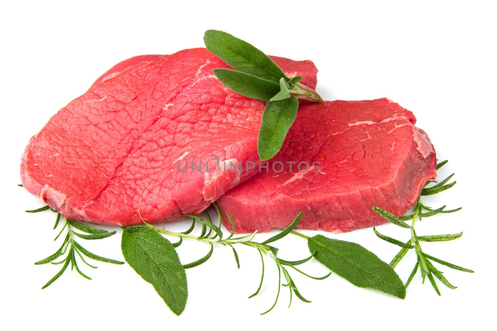 a red meat with sage and rosemary isolated on white background