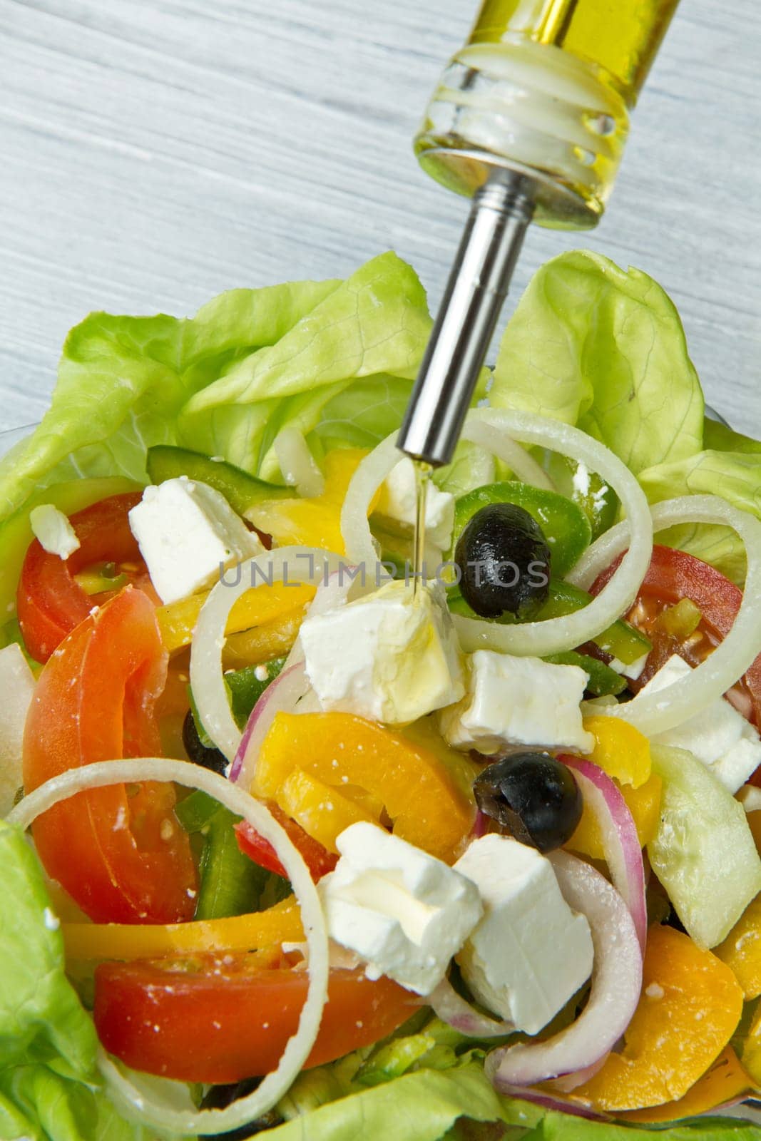 Feta salad with tomatoes, black olives  and fresh vegetables