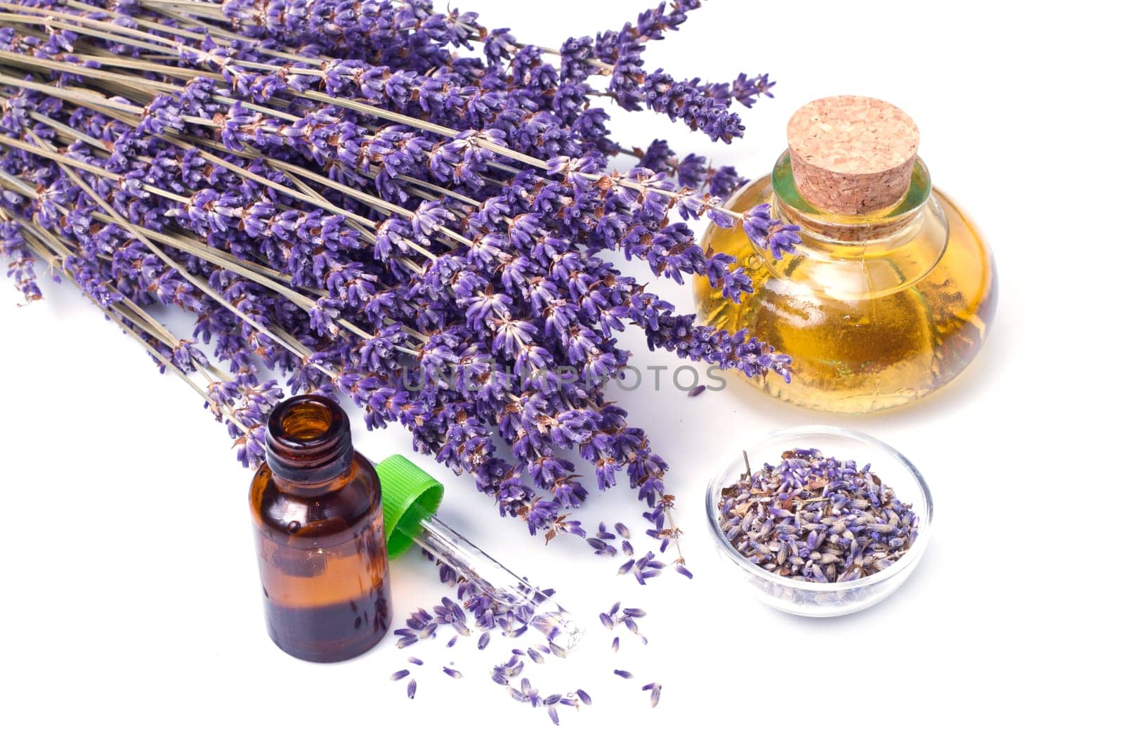 lavender flowers with oil  isolated on white background
