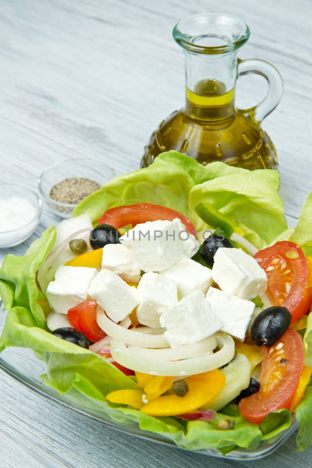 Feta salad with tomatoes, black olives  and fresh vegetables