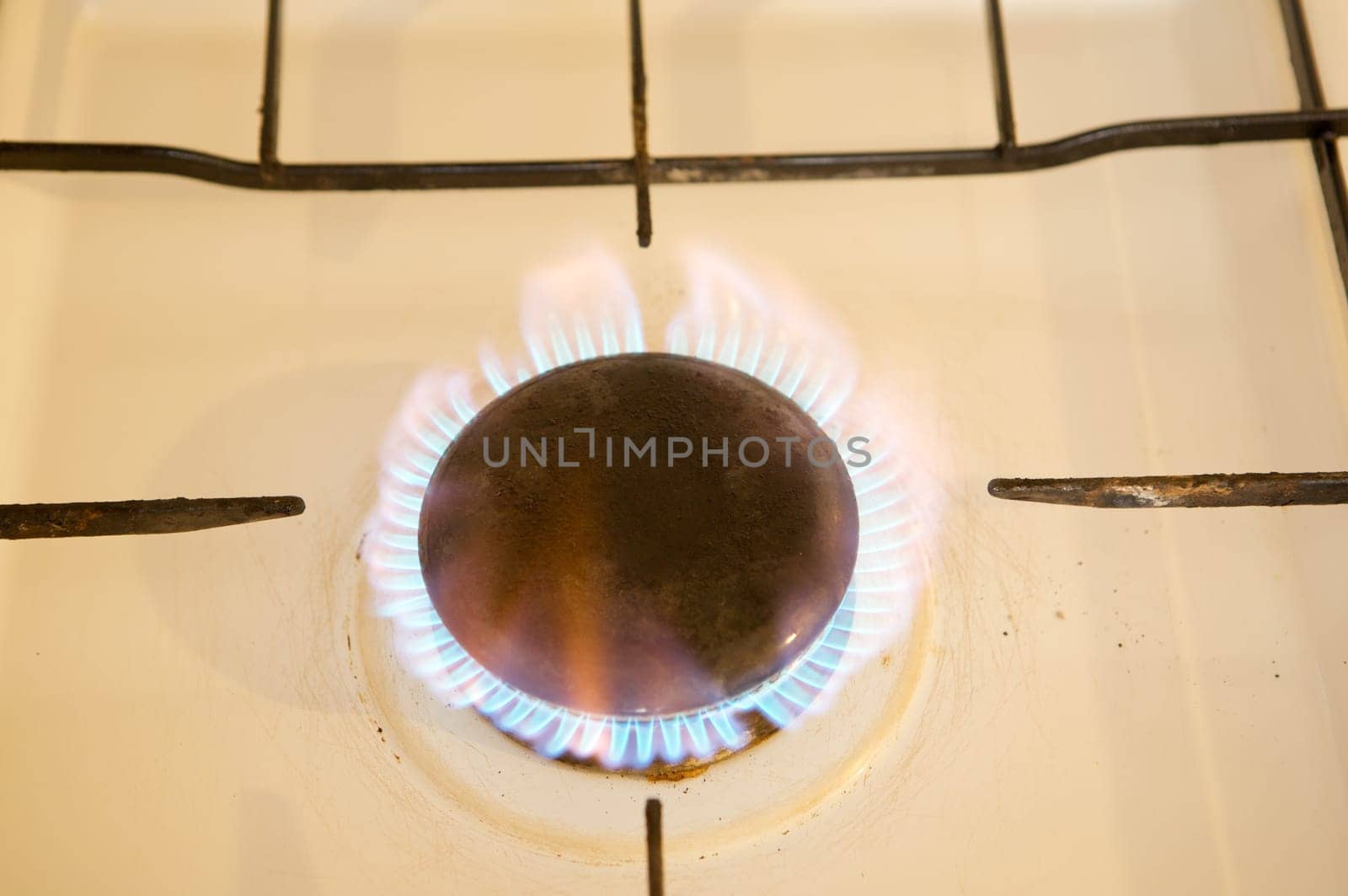 Photo of flames of kitchen oven burning gas