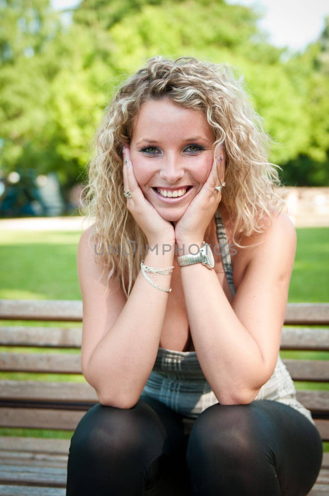 Exterior portrait of young smiling woman