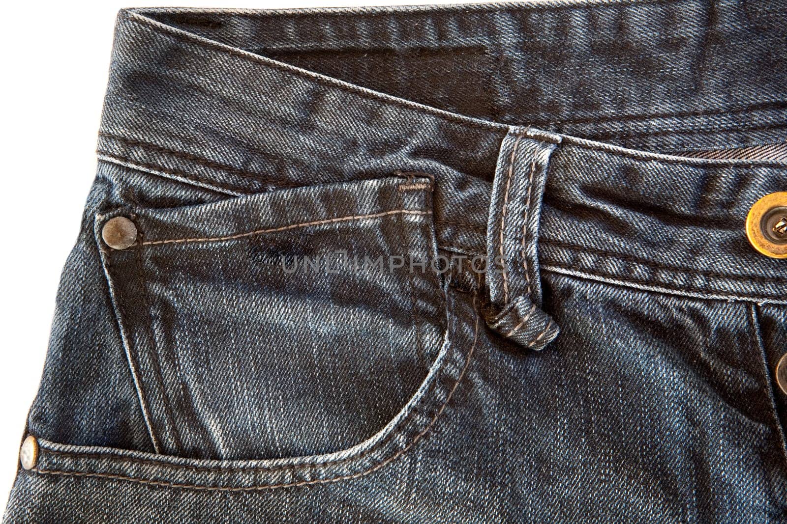 Photo of a pocket jeans with yellow thread