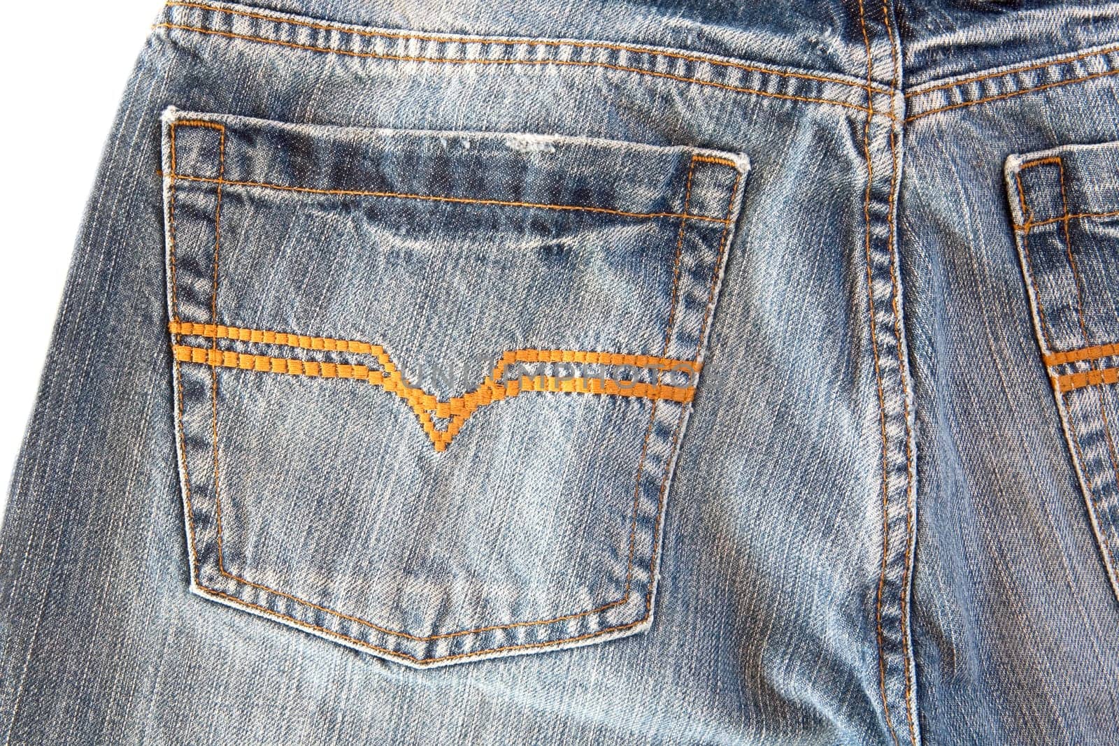 Photo of a pocket jeans with yellow thread