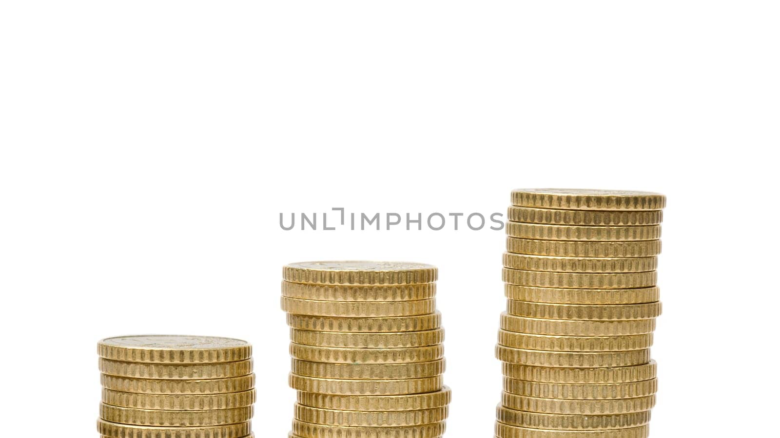 Three piles of money isolated on white