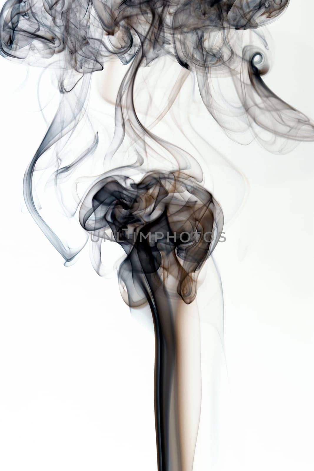 Abstract smoke shapes over a white background