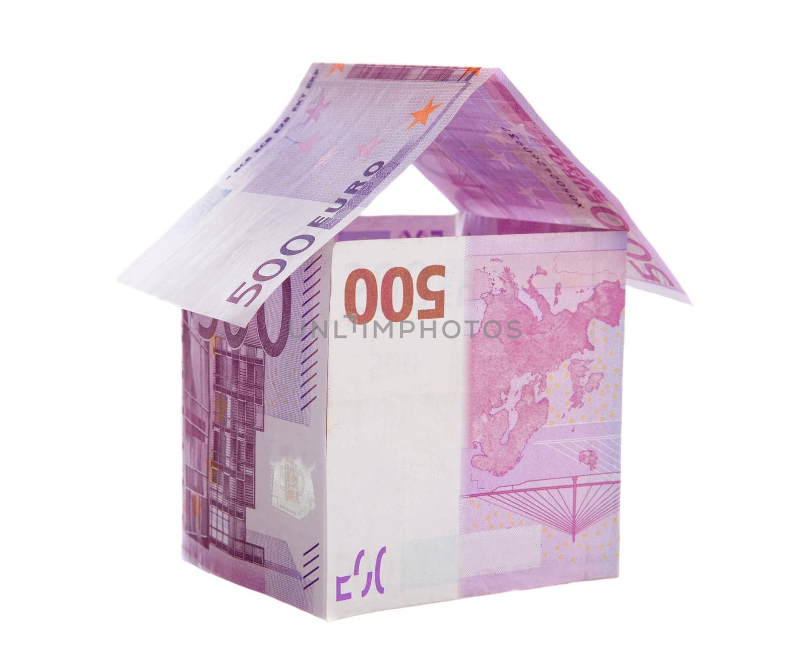 Money symbolizing a house isolated on a over white background