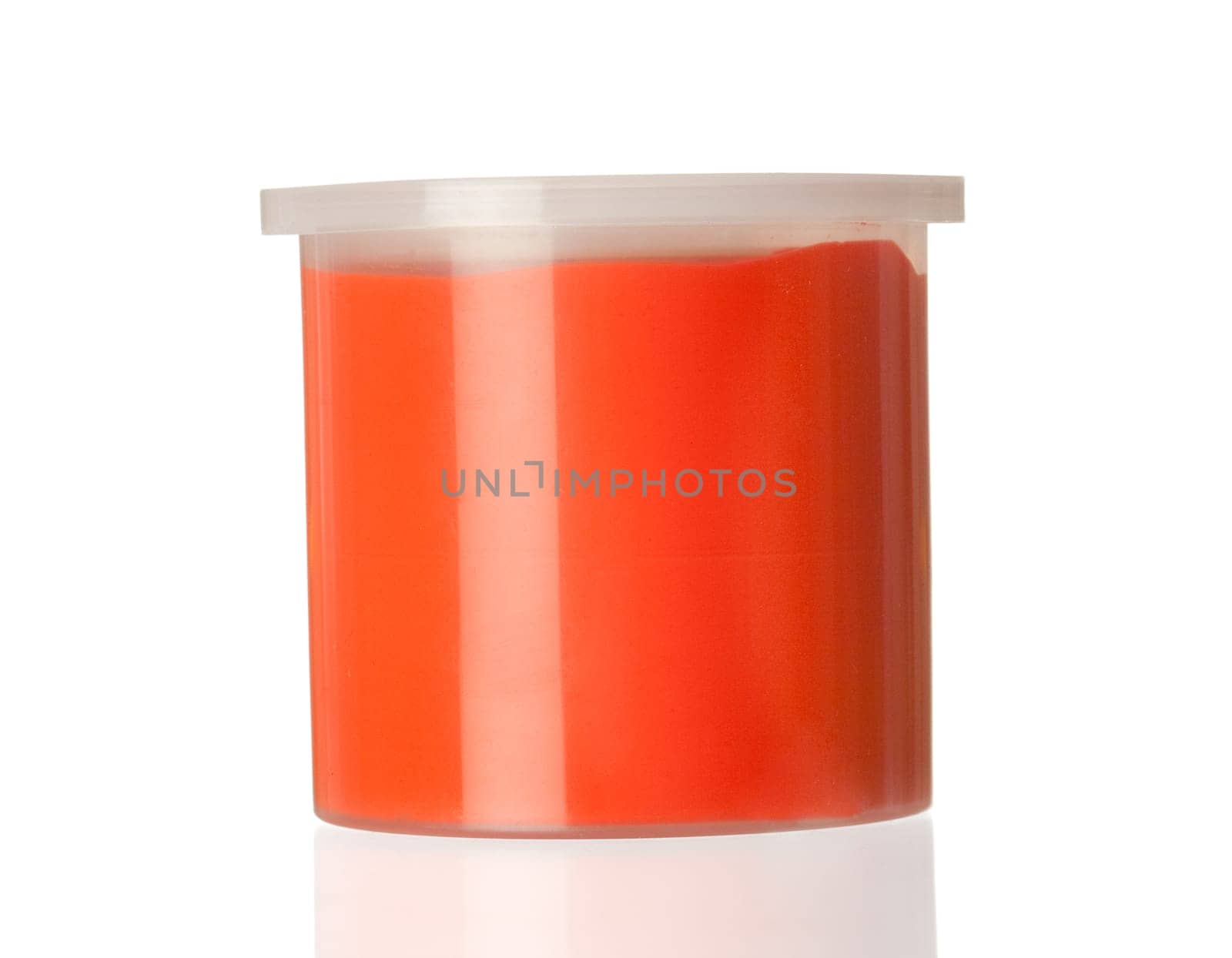 Container of red paint isolated on white background with reflection