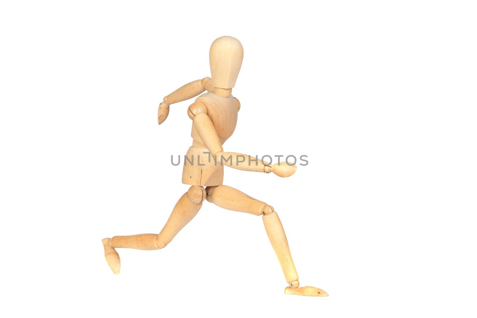 Jointed wooden mannequin running isolated on white background