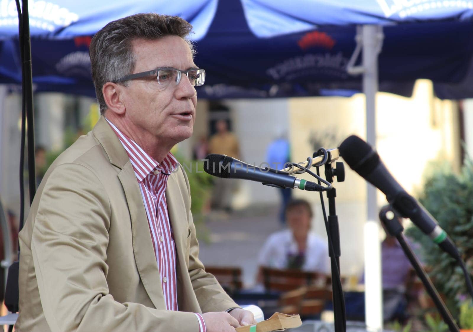 Federal Minister of Defence Thomas de Maizière reads from Alexandre Dumas' "Three Musketeers"" at the Meissen Literature Days 2011"