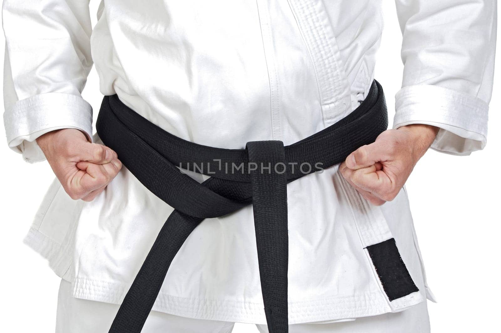 Black belt karate expert with rest position