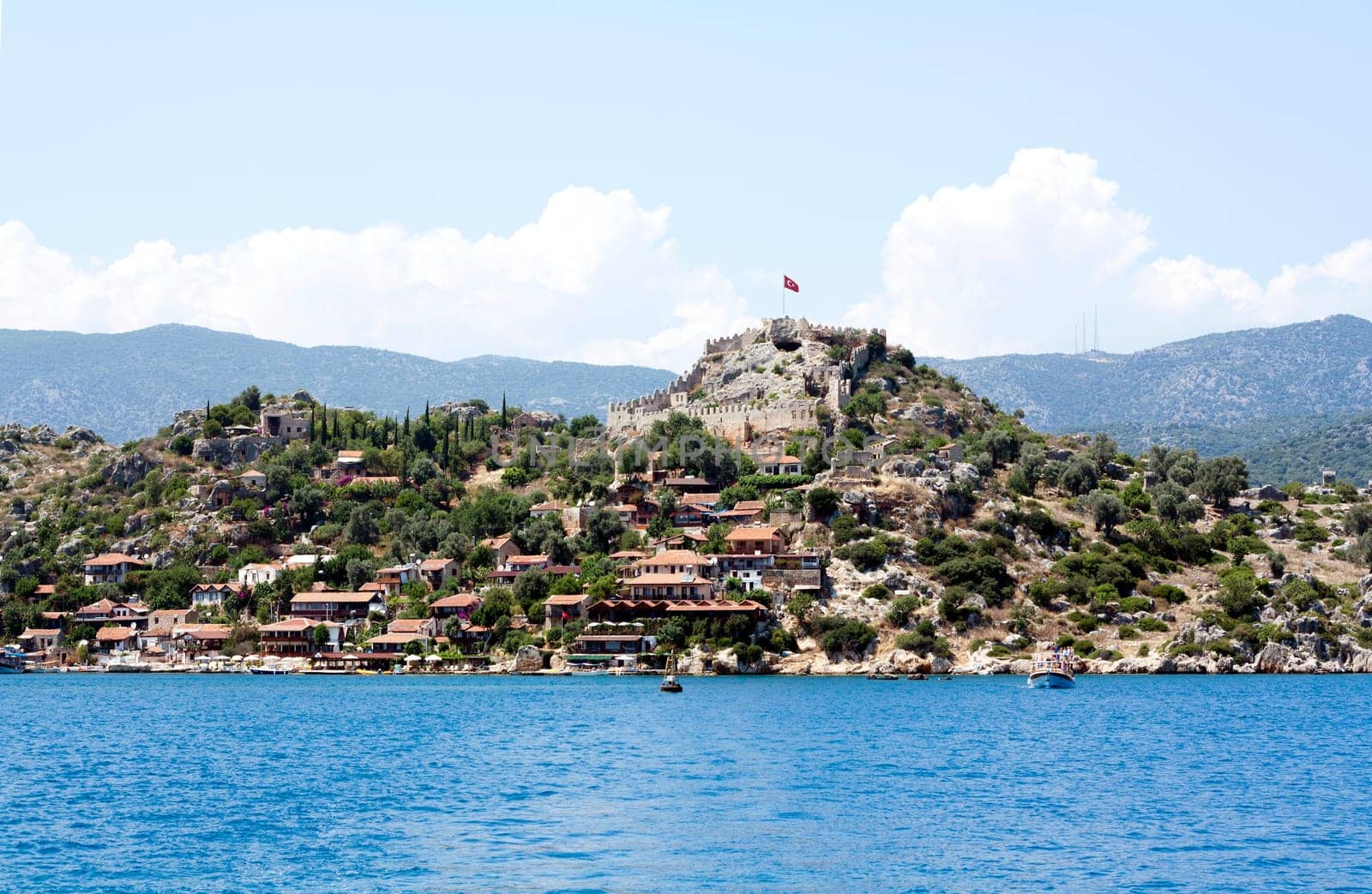 The village of Simena near Kekova. Ancient fortress on the top of the village.