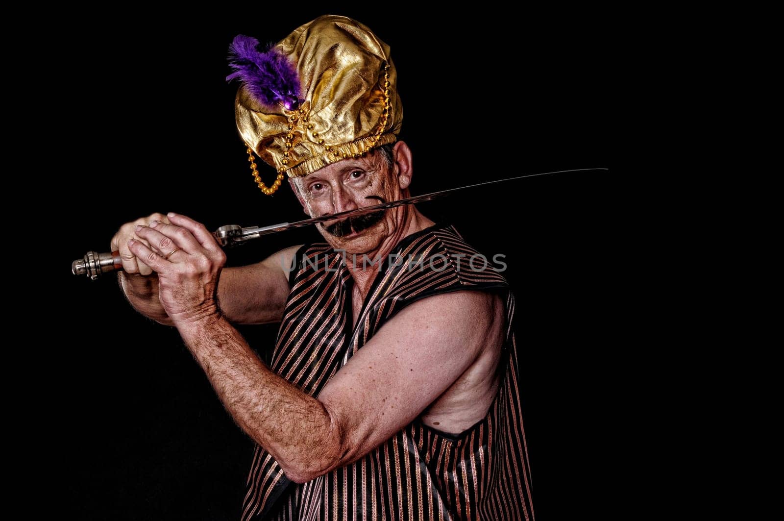 An elder sultan or sheik isolated over black