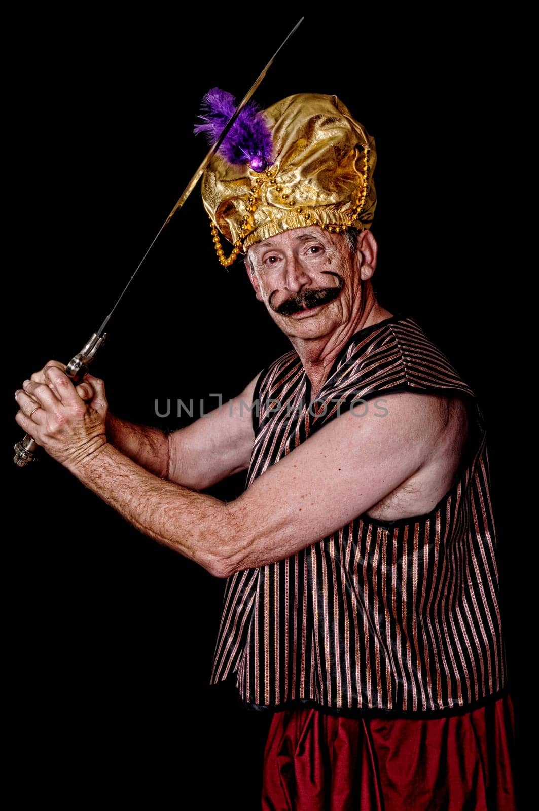 An elder sultan or sheik isolated over black