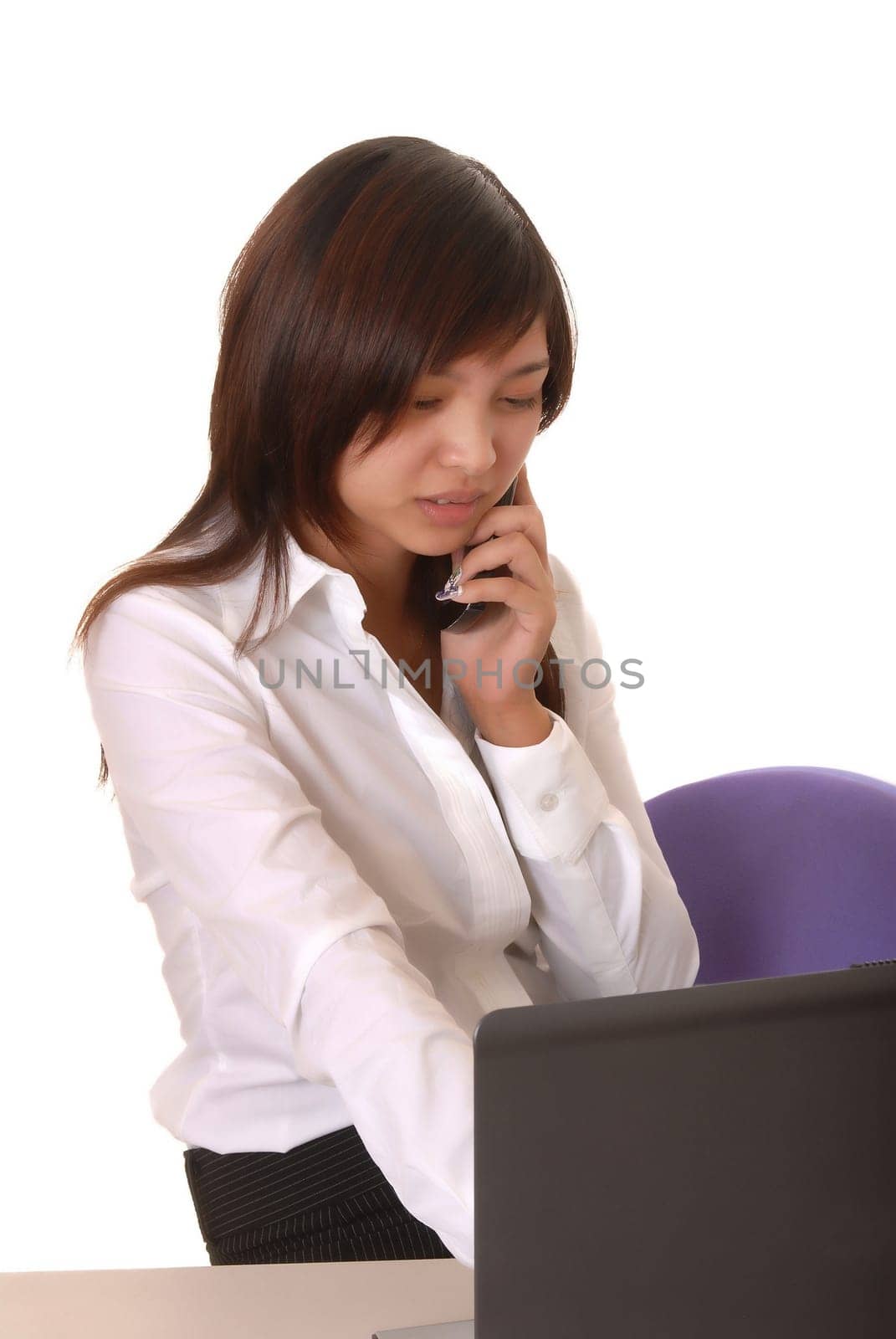 Lovely Asian business woman hard at work