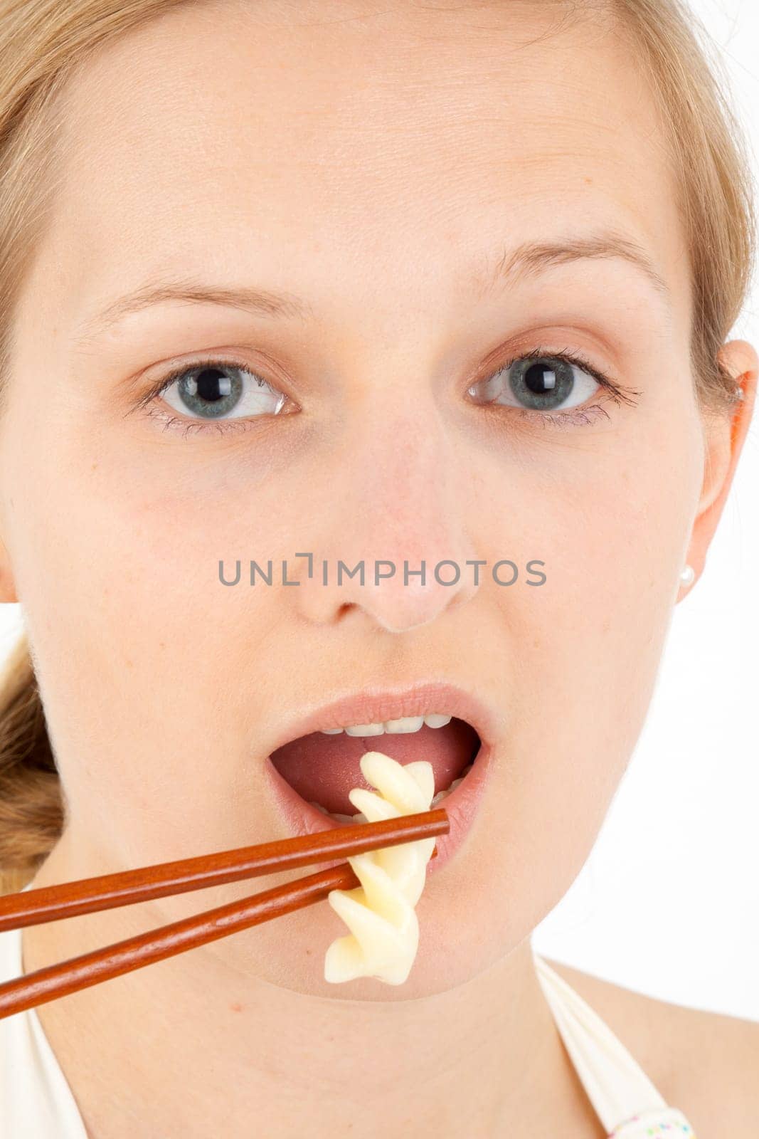 Young Fran eats extremely small food