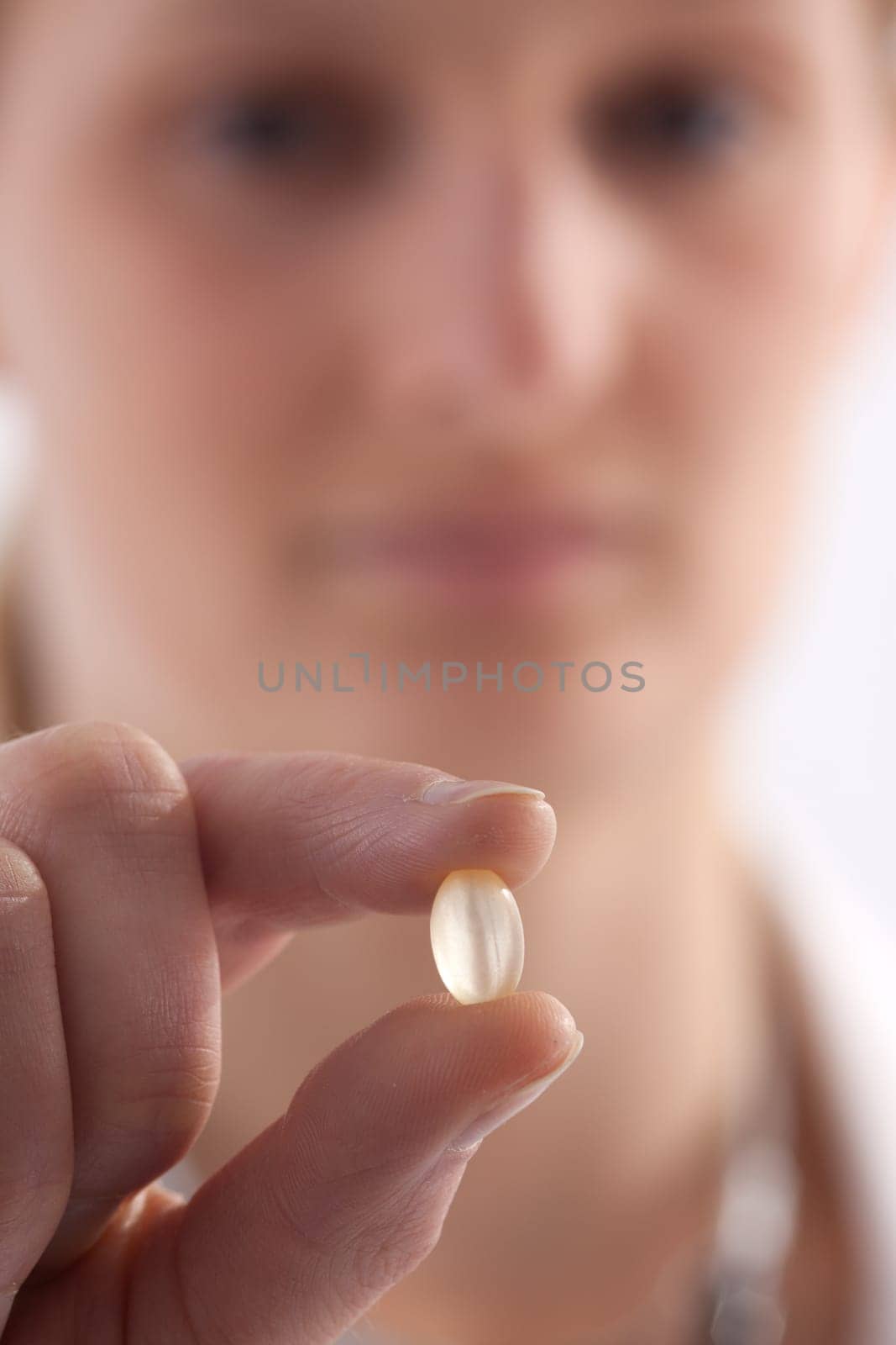 Female doctor or nurse with tablets