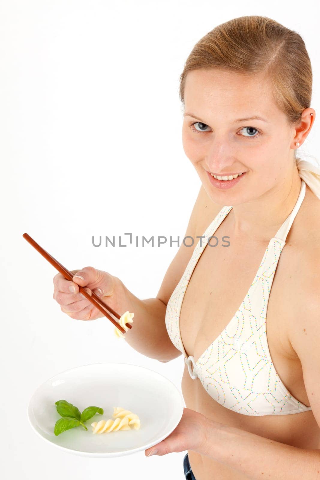 Young Fran eats extremely small food