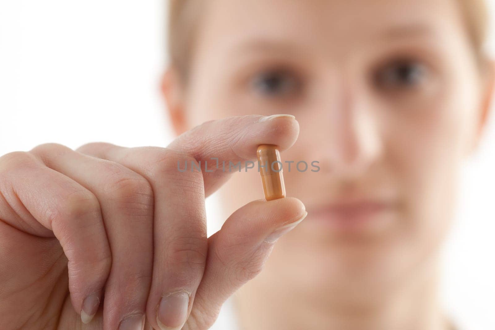 Female doctor or nurse with tablets