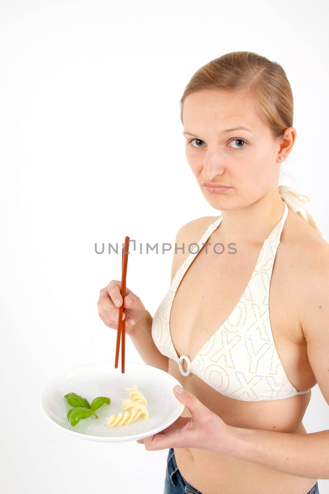 Young Fran eats extremely small food