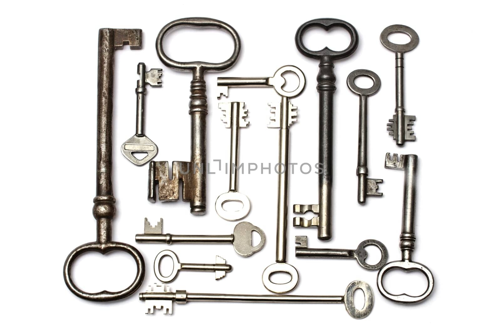 old keys closeup on white background.