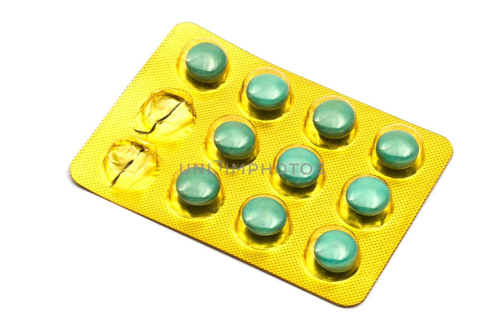 Package of Green Pills Closeup on white