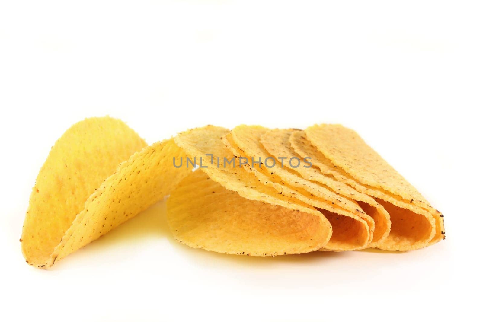 a couple of taco shells against a white background