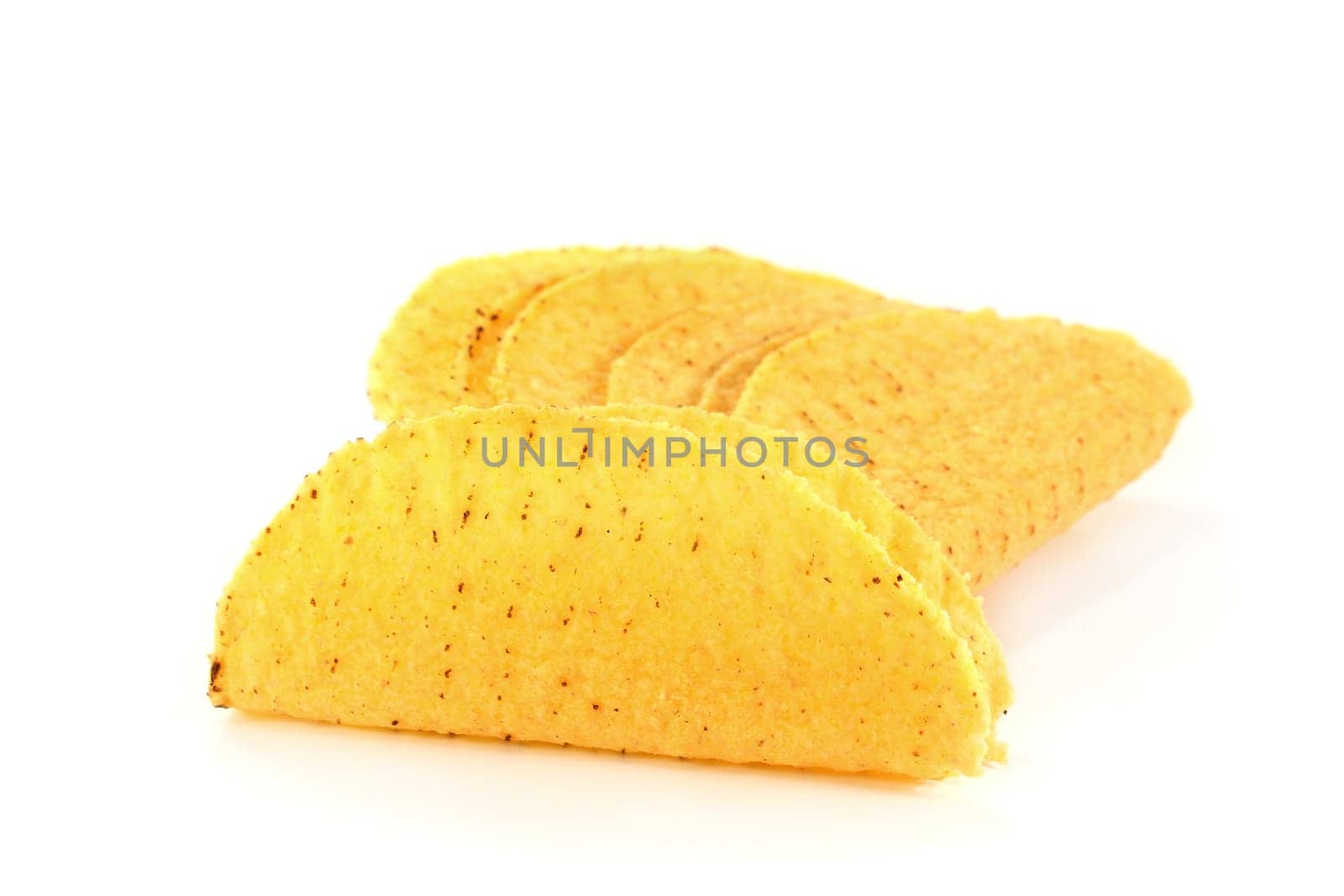a couple of taco shells against a white background